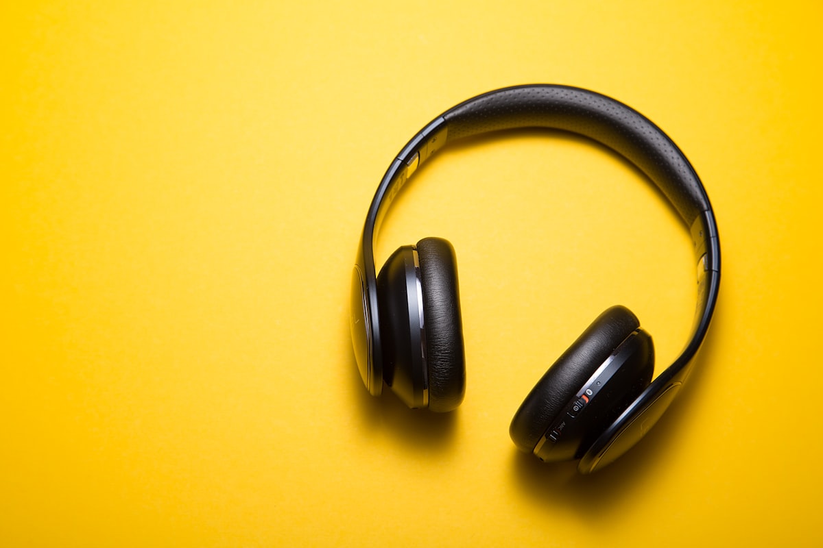 Wireless headphones on a review desk